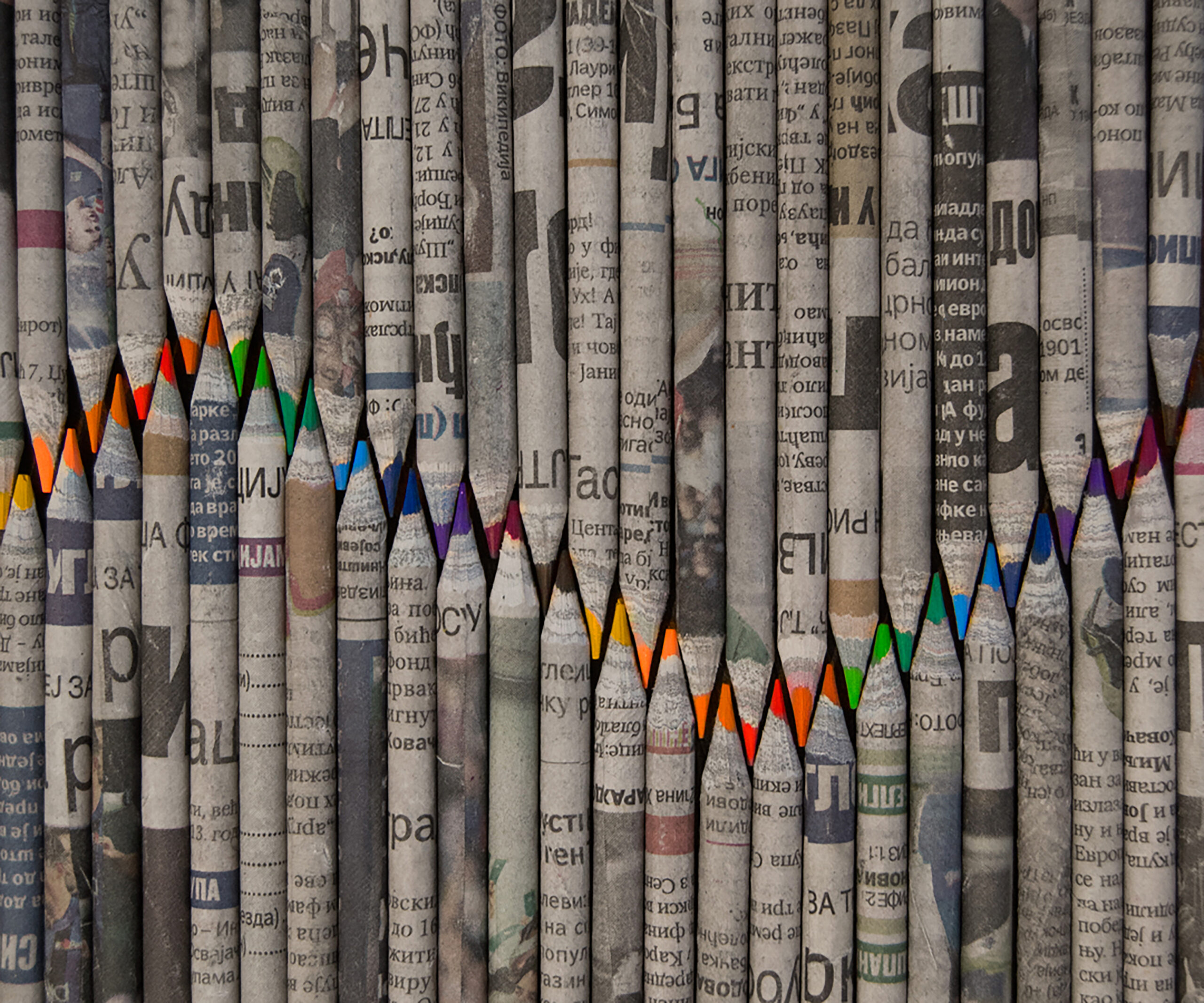 OLD NEWSPAPERS TURNED INTO PENCILS AND CRAYONS